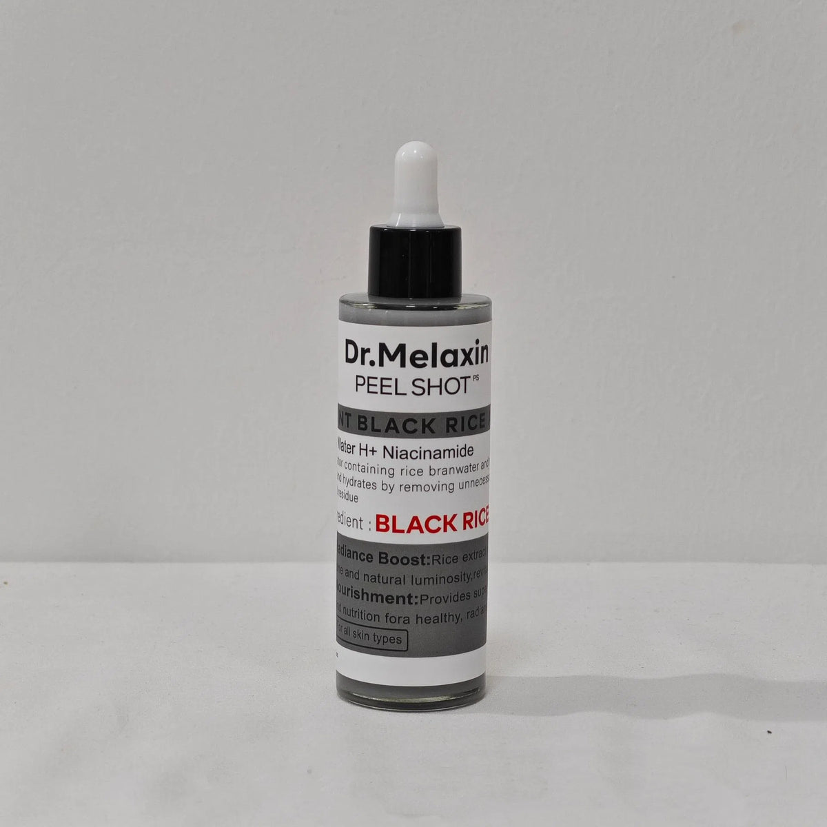 White and black rice peeling essence